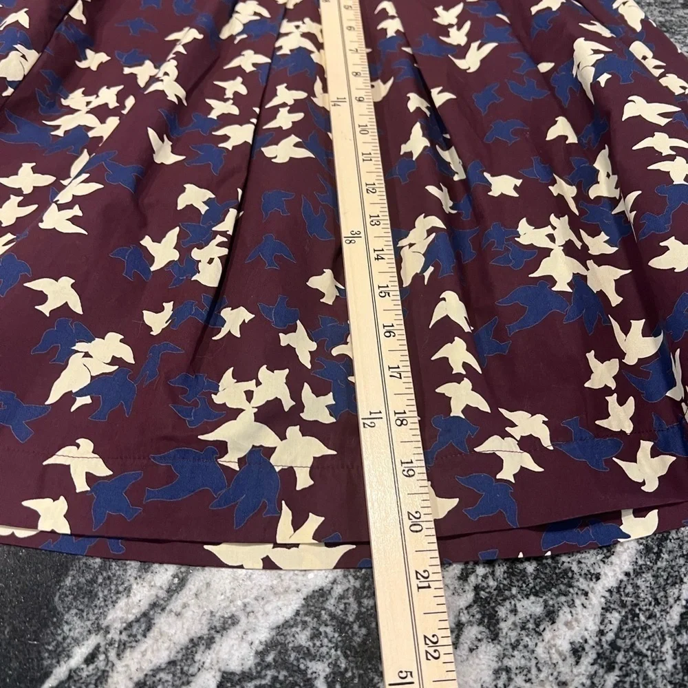 CUE Australia burgundy flock of birds short skirt